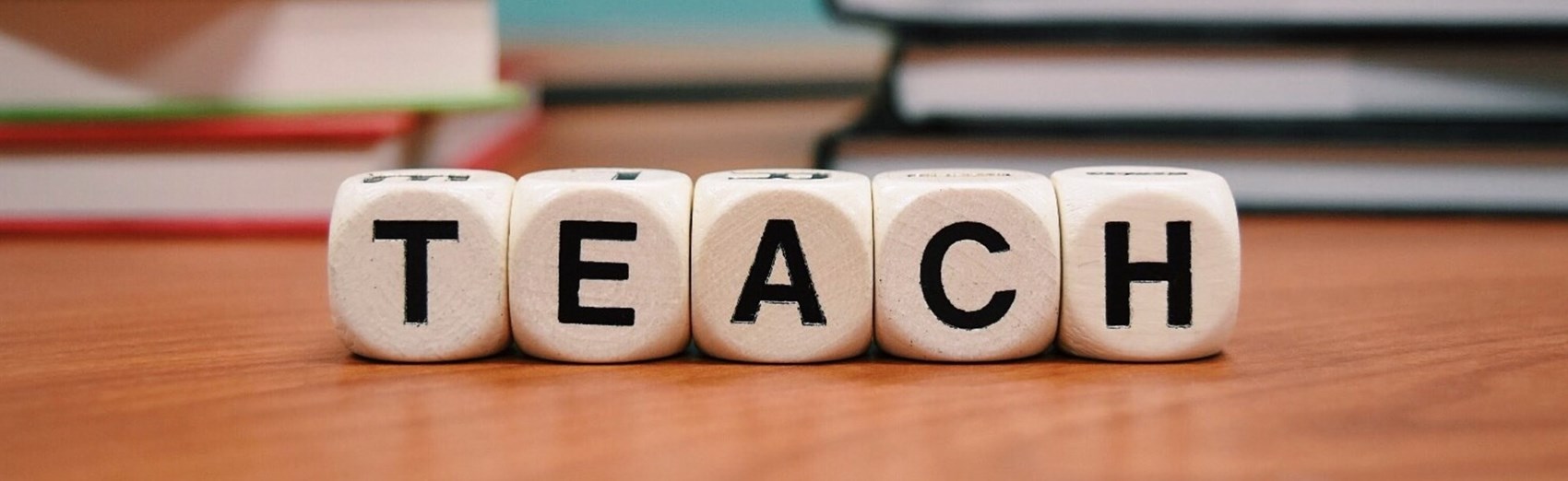 blocks spelling the word teach